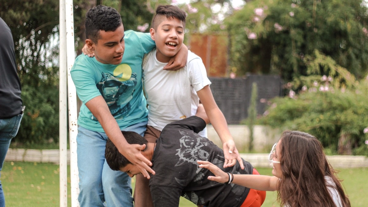 a group of people playing with a ball